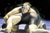 ROBERT DeBERRY/Frontiersman Colony senior Eric Fan maneuvers on
top of Dillingham'€™s Quinton Backford during the 215-pound
championship match at the Lancer Smith Wrestling Tournament earlier