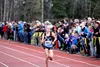 Chugiak's Campbell Peterson sprints toward the finish line during the ASAA Division I girls race. Jeremiah Bartz/Chugach Times