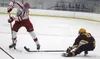Wasilla's Porter Schachle works to keep the puck out of the reach of Dimond's Jaiden Gibson during a 3-1 loss to the Lynx Friday, Nov. 10, 2017, at the MTA Events Center in Palmer. Jeremiah B