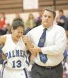 Palmer Moose athletic trainer Brian Larson assists Kelsey
Campbell off the court during a basketball game last season at
Palmer high School. ROBERT DeBERRY/Frontiersman