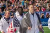 Lt. Col. Anthony Kurz and Capt. Chandler Smith, representing the U.S. Army Warrior Fitness Team, march onto the field during the 2019 CrossFit Games opening ceremony in Madison, Wis., Aug. 1,