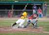 Mat-Su Miner Christin Stewart slides past Chugiak-Eagle River Chinook catcher Daniel Salters during a game at Hermon Brothers Field in Palmer this past season. ROBERT DeBERRY/Frontiersman.com