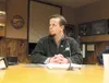 Brandon Wall takes his seat at the Wasilla City Council meeting Monday night. Wall was appointed to replace Steve Menard who was recalled last month. Robert DeBerry