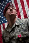 Air Force Master Sgt. Christopher G. Bowerfind, assigned to the 212th Rescue Squadron, poses for a portrait on Joint Base Elmendorf-Richardson, Alaska, Oct. 20. Bowerfind was awarded the Bron
