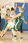 Colony guard Hayley Hotchkiss, left, and Colony forward Kara
Larson, right, double team Homerï¿½s Danilee Stapel during first
round competition of the 2008 Northern Lights Conference Basketba