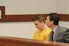 Erick Almandinger with his attorney in a pretrial hearing earlier this year. Almandinger is being tried separately from four other teens accused in the murder of fellow Valley teen David Grun