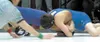 Wyatt McGann of Palmer Junior Middle School battles Max Torres
of Teeland Middle School during the 126-pound final of the Teeland
Invitational at Teeland Middle School on Saturday. McGann fin