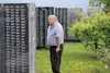 Ken Ray reads names of fallen U.S. servicemen on the Veterans Wall of Honor behind the Mat-Su Visitors Center next to Mat-Su Regional Medical Center in this Frontiersman file photo. Frontiers