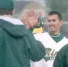 JEREMIAH BARTZ/Frontiersman Mat-Su catcher Nick Croce, right, is
congratulated by teammates after scoring one of the Miners’ five
runs in the second inning of a 5-2 win over the Anchorage Gla
