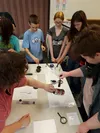 Big Lake junior sleuths enjoyed a presentation by retired Alaska State Trooper Steven Arlow on crime scene investigation — including how to dust for fingerprints. CHRIS FORD/Frontiersman