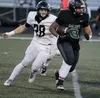 Colony junior Keoni Pili runs for a gain during a loss to South Anchorage. Jeremiah Bartz/Frontiersman