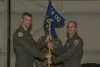U.S. Air Force Col. David Skalicky, 354th Operations Group commander, passes the 356th Fighter Squadron (FS) guidon to Lt. Col. James Christensen, 356th FS commander, during a squadron reacti
