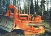 John Hemmer, in a photo taken in 1949, sits atop an
Allis-Chalmers dozer near Eklutna, where Hemmer was part of a crew
working to build a subgrade for the road between Anchorage and
Palmer. P