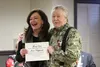 Bob Bowers presents a certificate to Joan Klapperich during the Wasilla City Council meeting Monday. Tim Rockey/Frontiersman