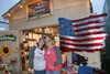 Tracy Lorentz and Karen Fitch pose at the Tracey's Treasures booth within the Alaska State Fair. Jacob Mann/Frontiersman