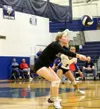 Riley Thompson grabs a dig during a 3-0 win over Kodiak on the first day of the Northern Lights Conference Championships Thursday at Palmer High School. Bruce Eggleston/matsusports.net