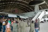 Spouses from the 3rd Wing receive a briefing on the E-3 Sentry Airborne Warning and Control System during an immersion tour at Joint Base Elmendorf-Richardson, Alaska, Aug. 31, 2021. The E-3 
