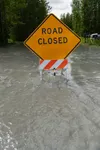 Ye Old River Road off the Old Glenn Highway was closed Monday after flooding impacted the Butte area near Palmer. J. David McChesney/Frontiersman