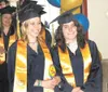 GENNA MOSES/Courtesy photo Su Valley Jr./Sr. High School Class
of 2009 graduates Shandi McEwen, left, and Willow Feeley enjoy
Thursday’s commencement.