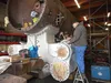 Volunteers Mike McKerrvey and Ron Dudley dry fit fasteners for the main steam delivery pipes to the cylinders of Engine No. 557 as part of its overhaul. Courtesy photo