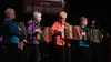 Members of Alaska Button Box Gang perform at the 31st Annual Anchorage Folk Festival this past weekend. Photo by John Christensen