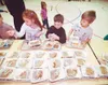 From left, Nichole Shanigan, Teddy John, and Alex Makitrin walk
through the lunch line at Iditarod Elementary School Wednesday
morning. Photo by WILLIAM WOODY/ Frontiersman.