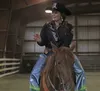2015 Miss Rodeo Alaska Laura Stockemer talks to the judges and contestants before the start of the 2016 Miss Rodeo Alaska pageant at Bluff Park Farm across from Snowshoe Elementary School on 