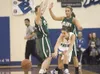 Palmer’s Taylor Blake passes the ball as she gets double-teamed
by Colony’s Tess Forstner, left, and Kate Klapperich. ROBERT
DeBERRY/Frontiersman Robert DeBerry