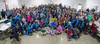 The Arctic Winter Games 2024 volunteers gather for a group photo at Raven Hall on the Alaska State Fairgrounds. J. David McChesney/Frontiersman