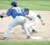 Mat-Su’s Scott Arthur dives back to first during a 5-2 win over
the Anchorage Glacier Pilots on Tuesday. The Miners beat the Pilots
2-1 on Wednesday in Anchorage. JEREMIAH BARTZ/Frontiersman