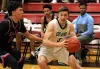 Colony's Sullivan Menard drives to the basket during a 66-46 win over East Anchorage during the first day of the Doc Larson Roundball Classic Thursday at Wasilla High School. Courtesy of Bruc