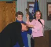 Paddy Coan pounds the gavel one last time as she relinquishes
her role as president of the Greater Wasilla Chamber of Commerce to
incoming president, John Klapperich. State Sen. Lyda Green,
R