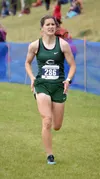 Colony's Ella Hopkins runs to victory in the girls varsity race at the Ted McKenney XC Invitational on Saturday, Aug. 24, Jeff Helminiak/Peninsula Clarion