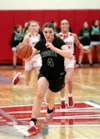 Colony's Jericho Wuestenberg drives the ball down the floor during a win over Wasilla. Bruce Eggleston/matsusportsd.net