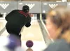 ROBERT DeBERRY/Frontiersman Hair Razors team member Russ Greer
shows good form as he releases his ball during league bowling
Friday at North Bowl along the Palmer-Wasilla Highway in
Wasilla.
