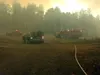 Crews battle the McKinley Fire near Mile 91 of the Parks Highway Saturday night. Courtesy photo