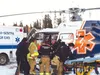 Responders load an injured pilot onto a waiting medevac helicopter Saturday afternoon.  Photo courtesy Brian Geerdes