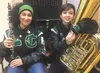 Lucia Oriol, left, and Catrina Carte pose with their instruments at the Frontiersman offices on Saturday. The two Colony High School students were selected to perform with the Bands of Americ
