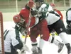 Colony’s Alex Svoboda checks Wasilla’s Colton Fletcher into
Colony goalie Forest Savel during Friday’s game at the Curtis D.
Menard Memorial Sports Center in Wasilla. ROBERT DeBERRY/Frontiers