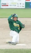 Mat-Su Miners catcher Bobby Jacobs slides into third base during
Thursday’s game against the Anchorage Bucs. ROBERT
DeBERRY/Frontiersman
