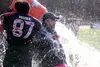 Houston players dump a water cooler on head coach Glenn Nelson as the Hawks celebrate winning the 2019 Division III state football title with a 41-8 win over Barrow Saturday, Oct. 19, 2019, a