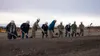 U.S. Air Force Col. David Wilson, the commander of the 673d Air Base Wing and Joint Base Elmendorf-Richardson, alongside Alaska Gov. Mike Dunleavy, break ground with personnel involved with t