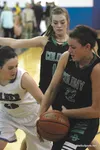 Colony senior Ashley Turcotte tries to steal the ball during a win over Palmer at Palmer High Feb. 28. Courtesy of Bruce Eggleston/mats