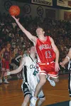 Wasilla's Buddy Bailey lifts in a shot with his fingertips
during the the Warriors' championship contest with Colony. Bailey
scored 18 points to lead Wasilla past the Knights 55-49. Wasilla
a