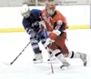 ANDREW GOOD/For the Frontiersman Wasilla sophomore Michael
Johnston, right, moves the puck past Palmer'€™s Dalton Buness
during a 5-3 win over the Moose at the Curtis C. Menard II Memorial
Ic