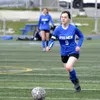 Palmer senior captain Rileigh Day moves the ball up the field during a tie against Soldotna last week. The Moose followed with a 2-0 victory over Grace Christian, which clinched the Northern 