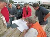 Ed Strabel, president of the Mat-Su Ski Club, discusses projects that can be done on the Mat-Su Community Day of Service at the Government Peak Recreation Area at Hatcher Pass with the Day of