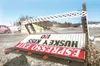 Bullwinkles Espresso’s sign lays on its side along the
Palmer-Wasilla Highway Thursday. The National Oceanic and
Atmospheric Association reported gusts up to 80 mph as of 2 p.m.
ROBERT DeBERR