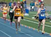 Palmer's Ruby Woodings, right, holds off Dimond's Ruth Cvancara to win the girls 4A 800 meter run at the 2017 ASAA State Track and Field Championships at Palmer High School on Saturday, May 2