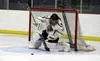 Colony goaltender Joey Diltz makes a save during a win ove Eagle River in December. During a recent road trip to the Kenai Peninsula, Diltz was won of three Colony netminders to record a shut